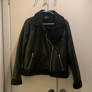 NWT: Faux Leather w/ faux fur lined black Goldie jacket. Size L